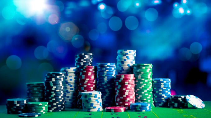 Casino chips with dramatic lighting and lens flares